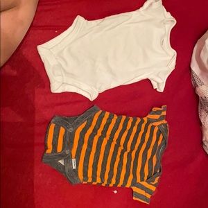 Two newborn short sleeve onesies